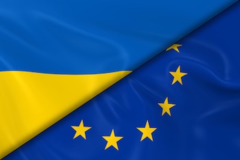 Flags of ukraine and the european union divided diagonally