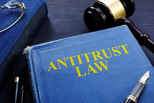 Antitrust Experts Characterize FTC v. Qualcomm Decision as Mangling of Sherman Act’s Section 2. https://depositphotos.com/219806902/stock-photo-antitrust-law-book-gavel-desk.html