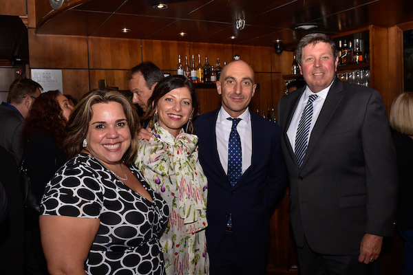 Renee Quinn (left) with Frank Cullen (right) and Matteo Sabattini (Ericsson) and his wife Fanny Carlet.