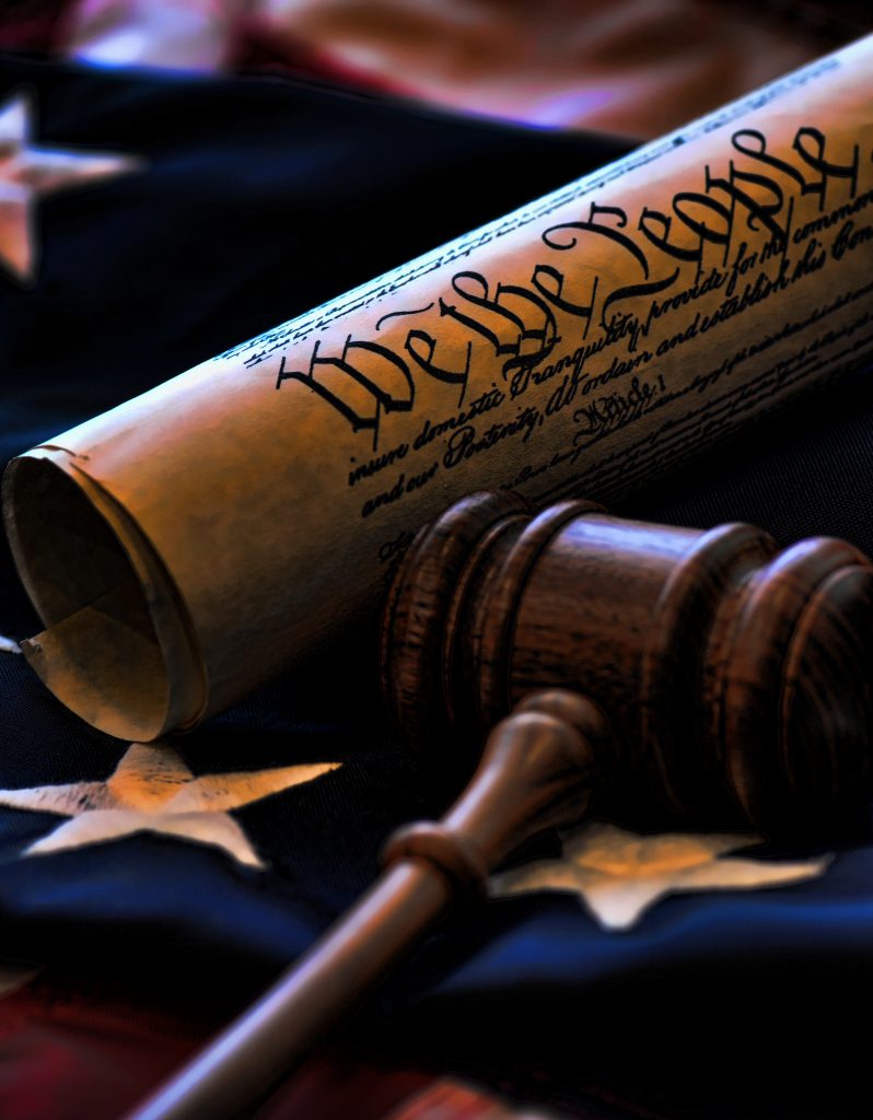 https://depositphotos.com/38780871/stock-photo-gavel-with-constitution-and-flag.html